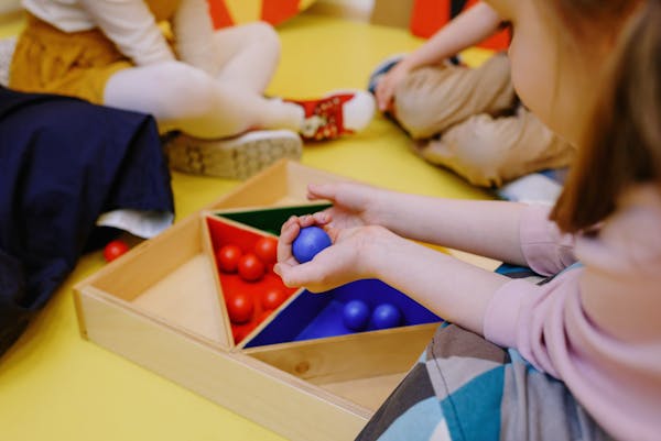 Child working with numbers and shapes